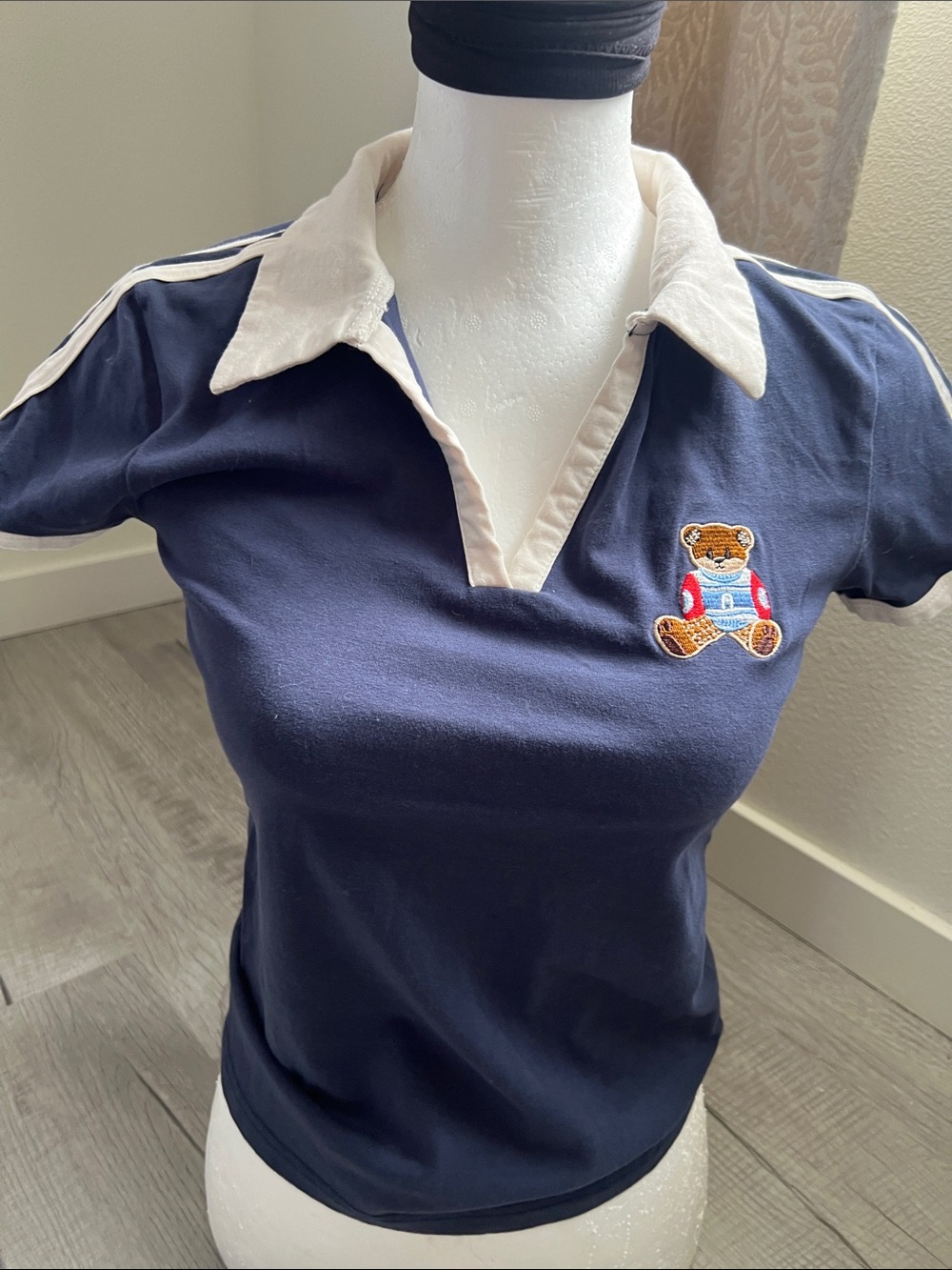 Women’s Navy Short Sleeve Polo Tee with Teddy Embroidery
